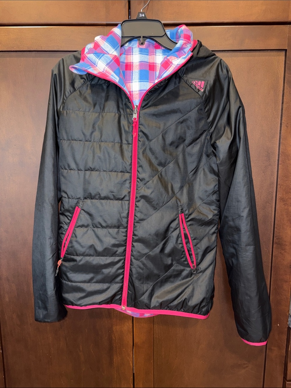 Adidas Reversible Black Jacket with Pink/Blue Plaid. Size small.